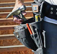 Builder wearing a toolbelt