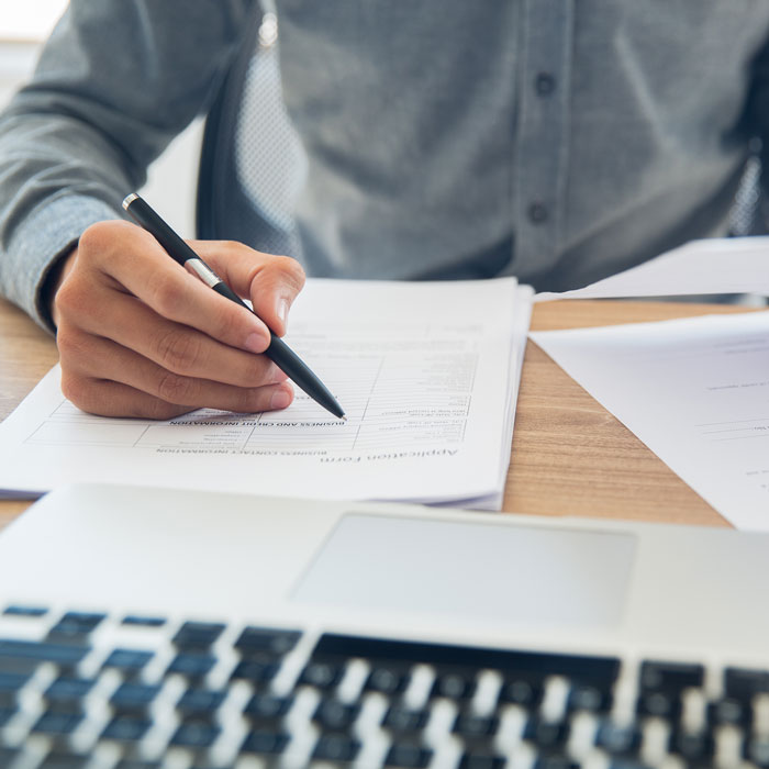 man reviewing documents